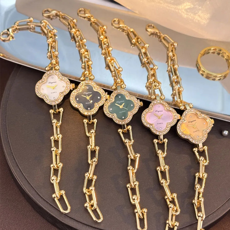 Lucky Four-Leaf Clover Design Women's Watch with Gold Chain and Gem-Studded Bezel