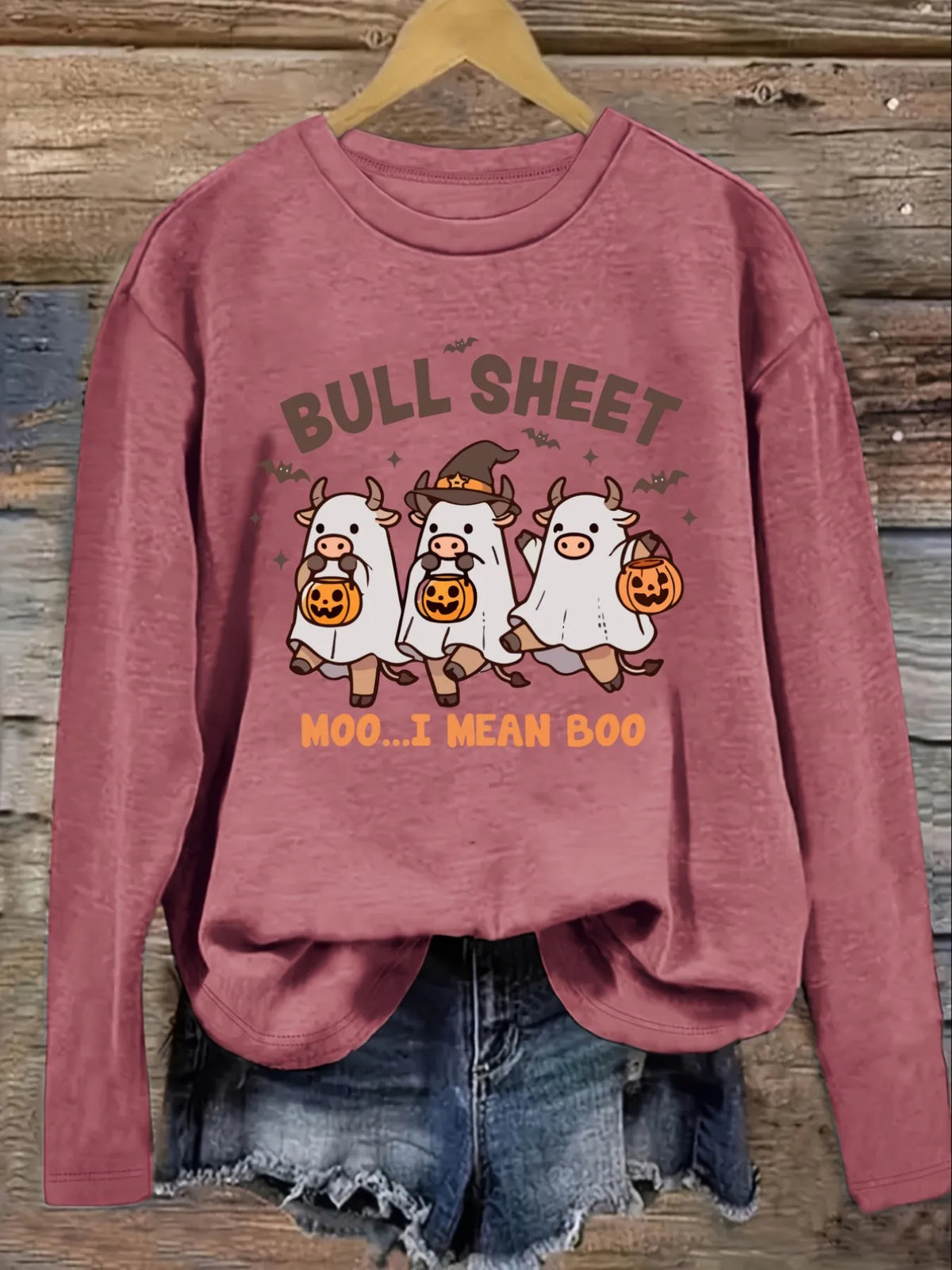 Women's Casual Long Sleeve Crew Neck T-Shirt Halloween Cows With Pumpkins.