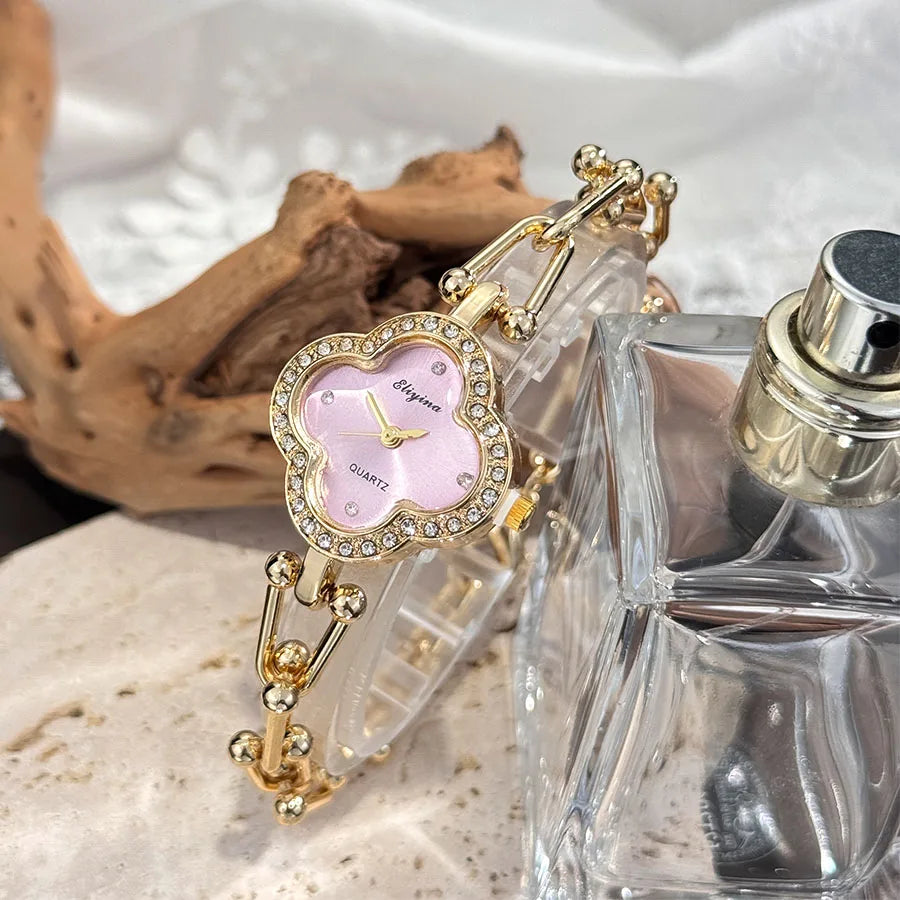 Lucky Four-Leaf Clover Design Women's Watch with Gold Chain and Gem-Studded Bezel