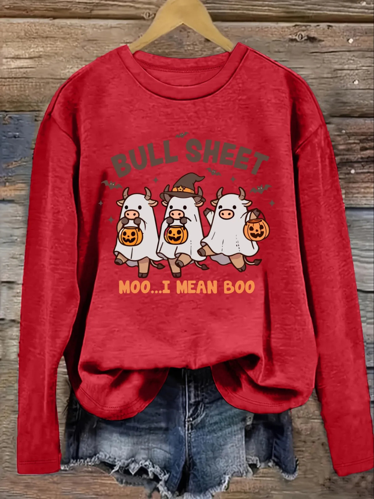 Women's Casual Long Sleeve Crew Neck T-Shirt Halloween Cows With Pumpkins.