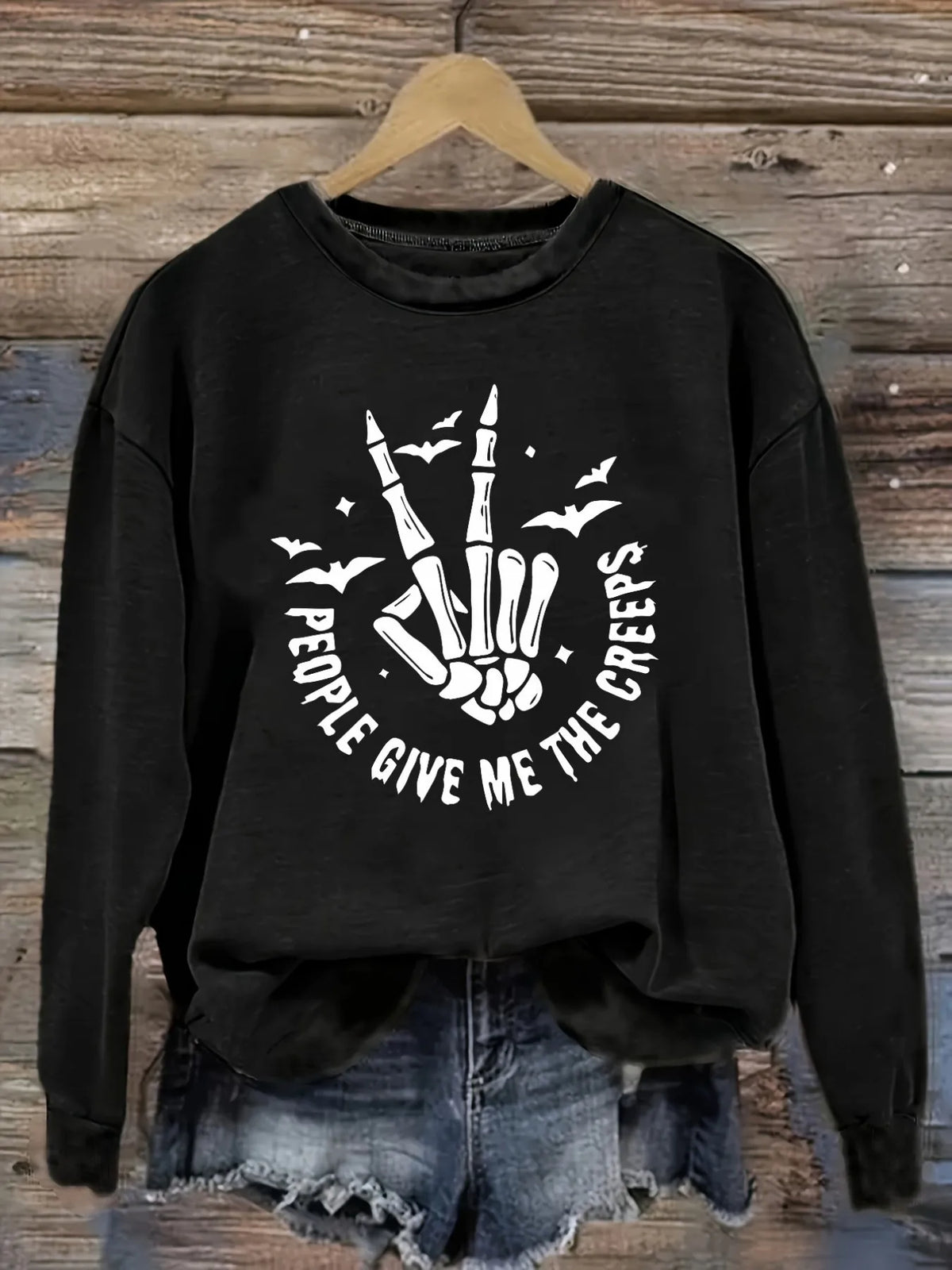Women's Casual Long Sleeve Crew Neck T-Shirt Skeleton Hand Give Creeps Design.