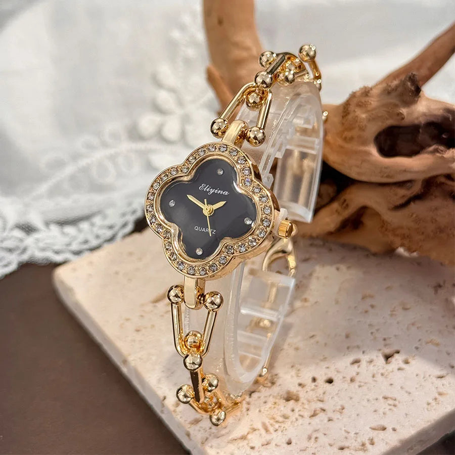 Lucky Four-Leaf Clover Design Women's Watch with Gold Chain and Gem-Studded Bezel