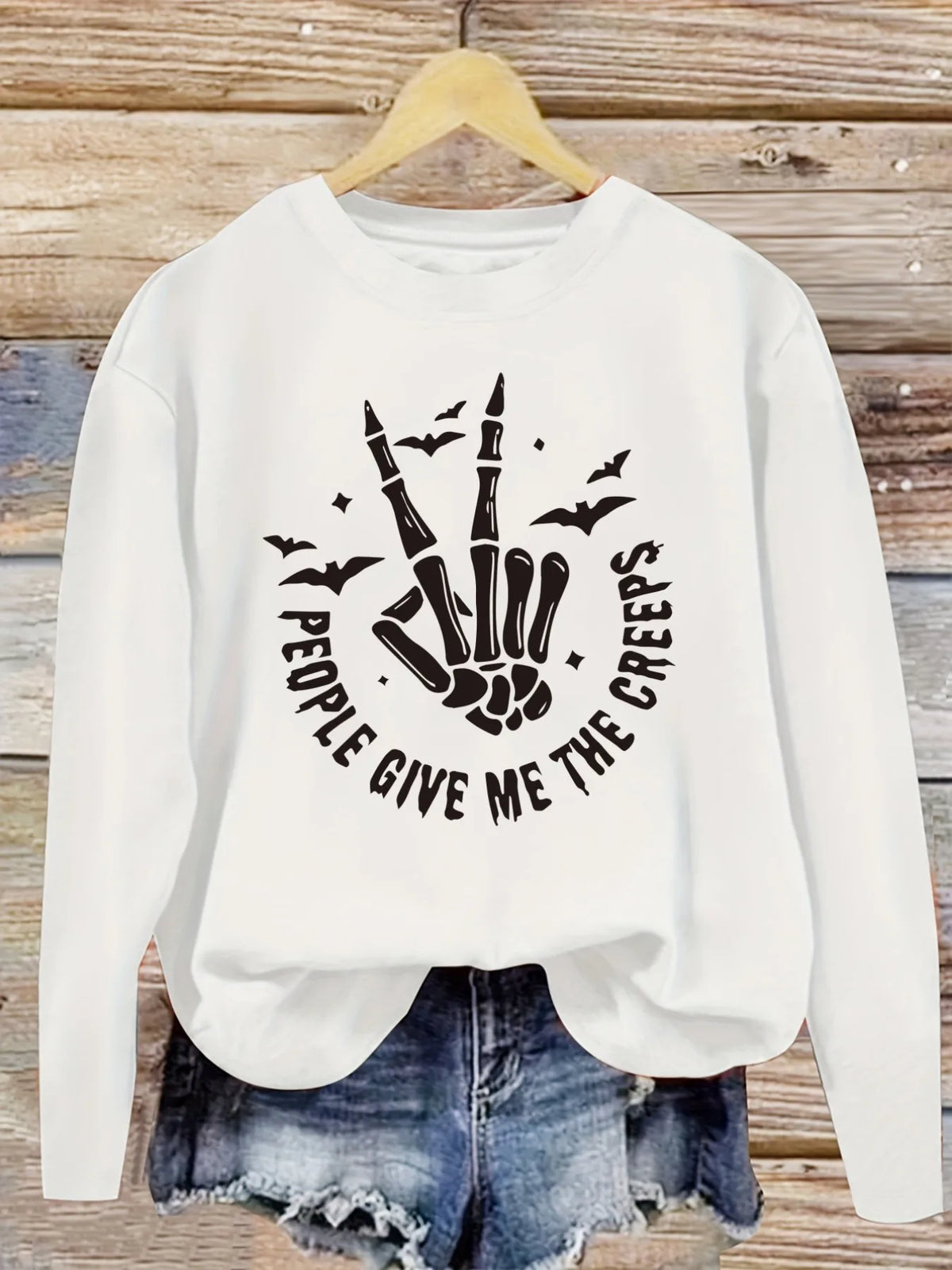 Women's Casual Long Sleeve Crew Neck T-Shirt Skeleton Hand Give Creeps Design.